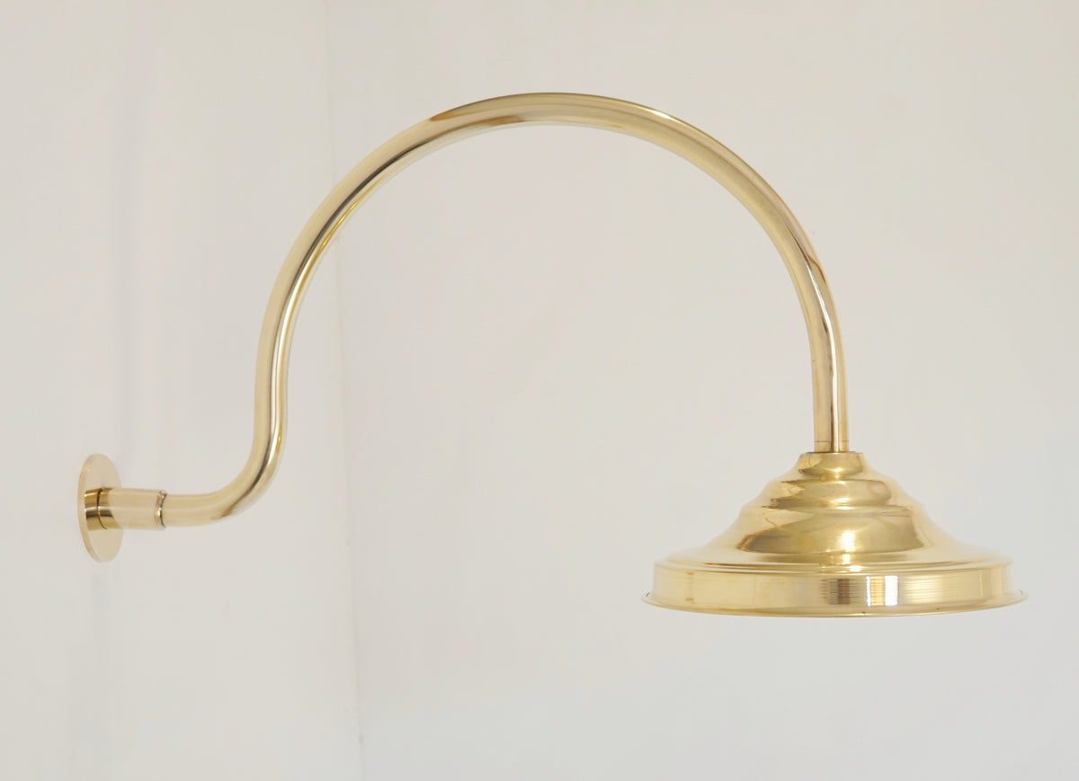 Wall-mounted Santorini brass shower with curved arm
