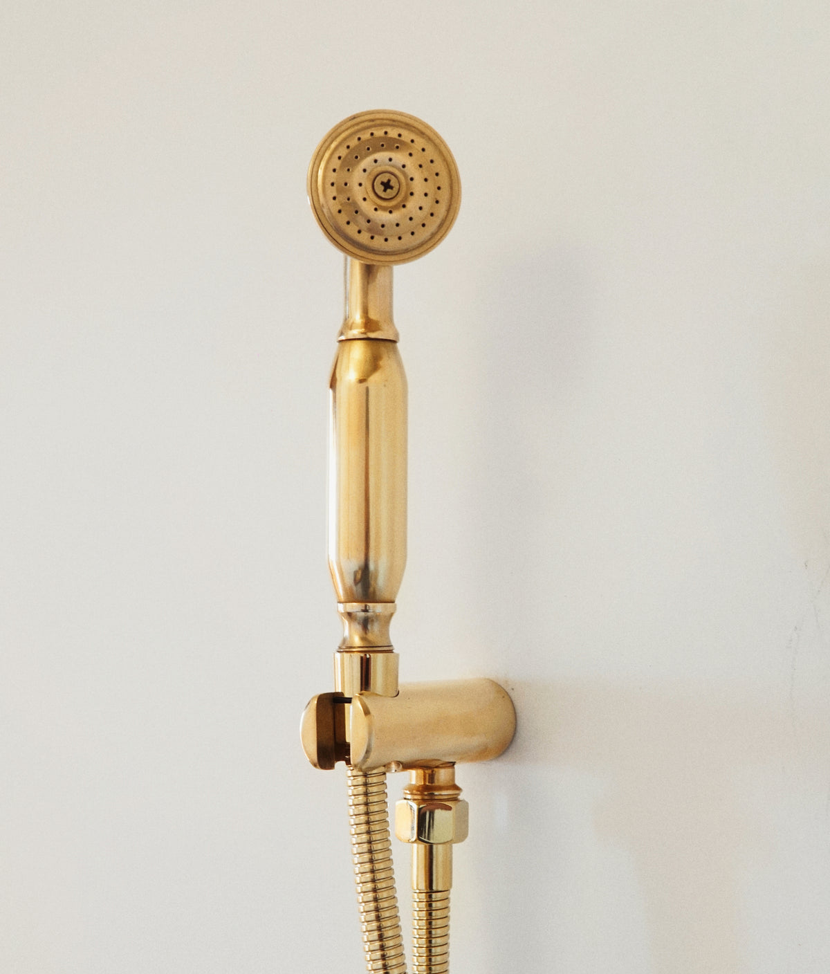 Unlacquered brass Oasis rainfall shower for bathrooms