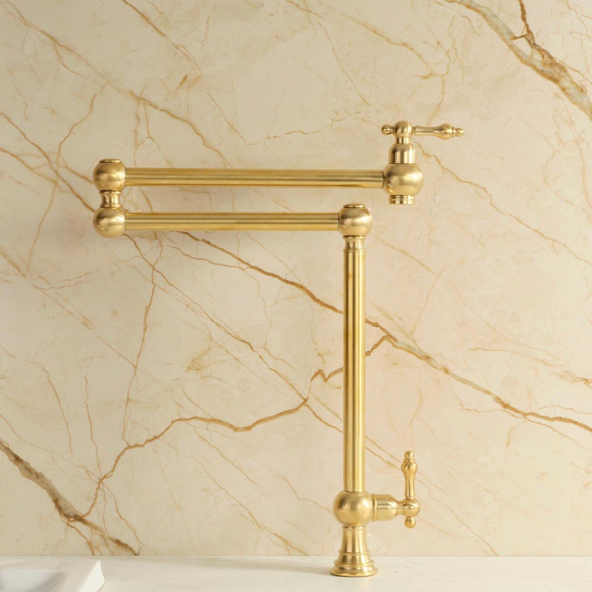 Standing brass pot filler faucet for filling pots at the stove