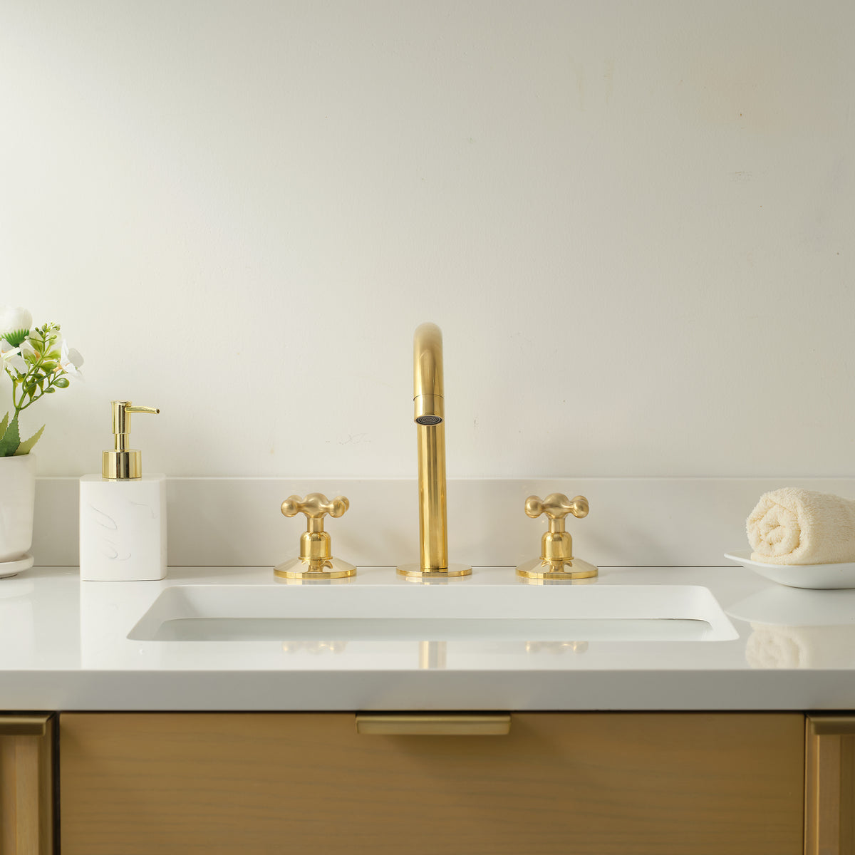Handcrafted unlacquered brass three-hole bath faucet