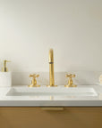 Handcrafted unlacquered brass three-hole bath faucet