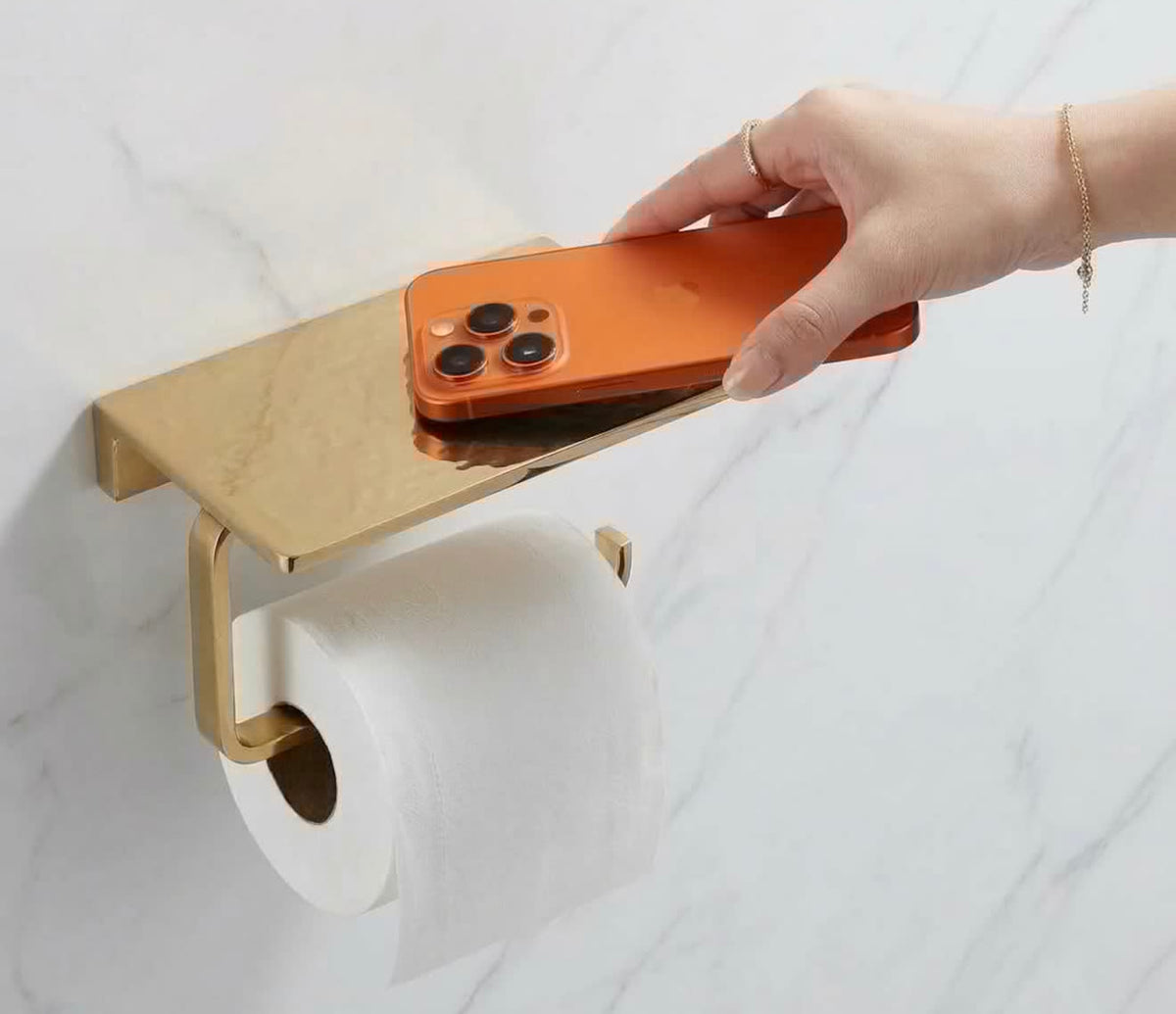 Brass toilet roll holder with storage by Brasslik