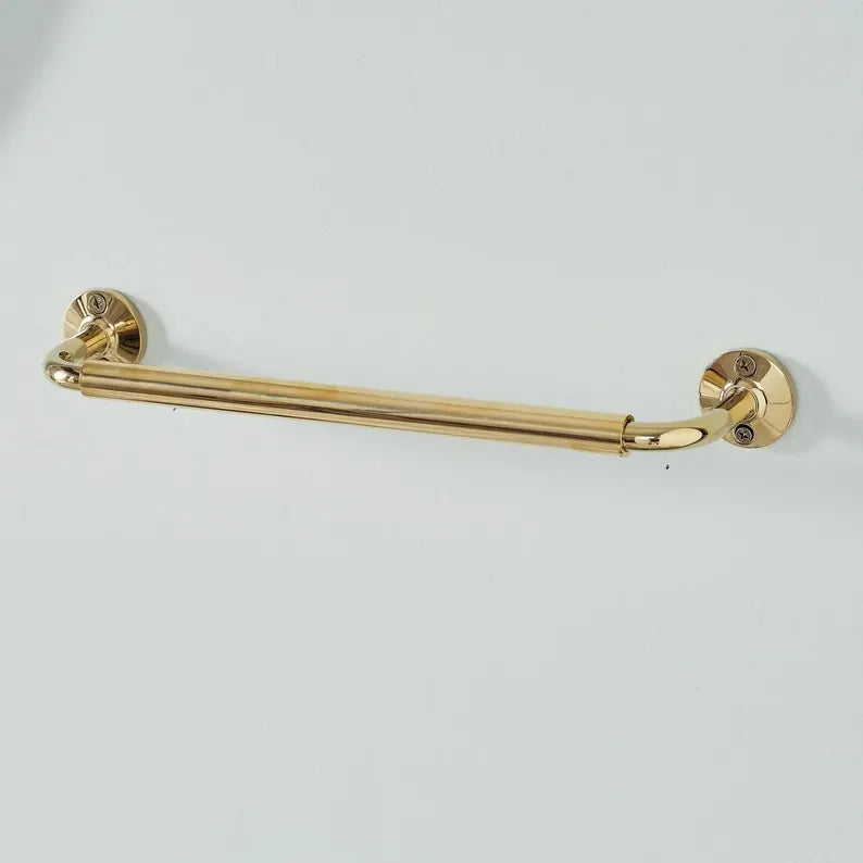Wall mounted unlacquered brass bathroom towel rail