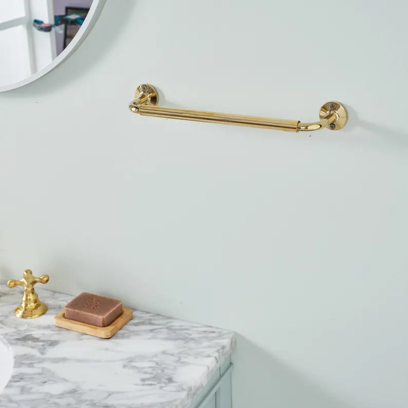 Brass towel bar that develops a natural patina