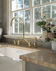 Brasslik Victorian bridge faucet in unlacquered brass