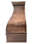 Vintage copper range hood in natural aged finish