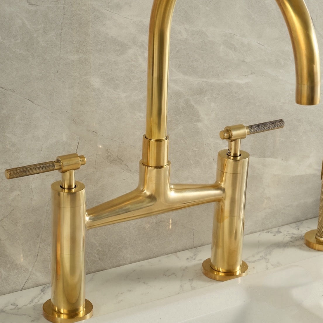 Vintara brass bridge faucet for kitchen sinks