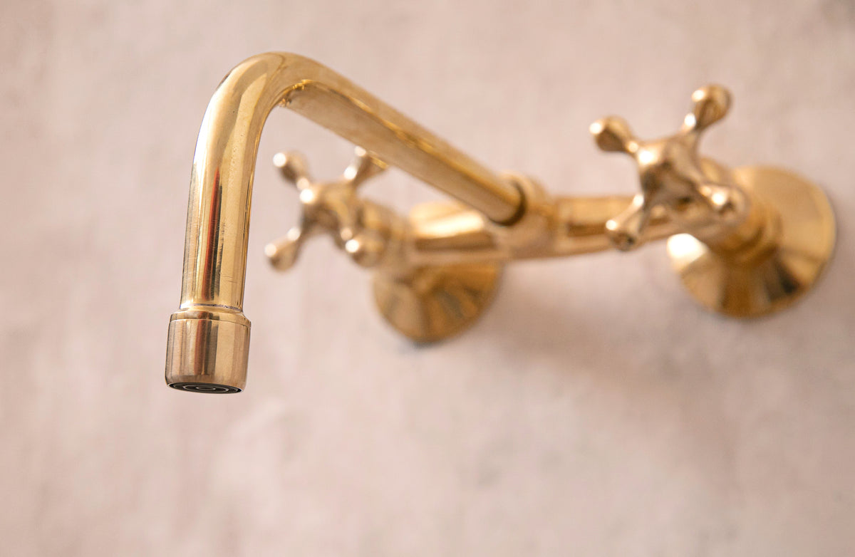 Winchester solid brass wall faucet for sinks