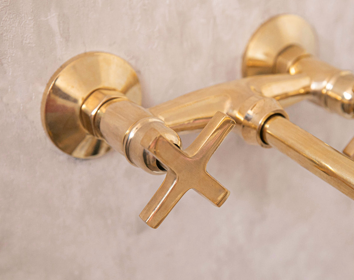 Traditional Winchester brass wall mount faucet